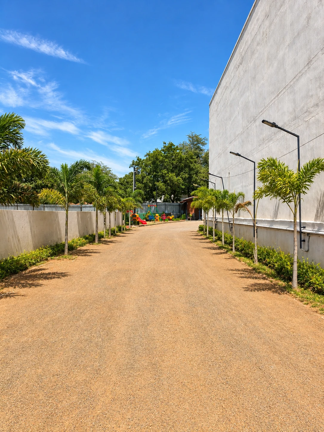 Tree-lined entrance pathway at KKV Tenkasi